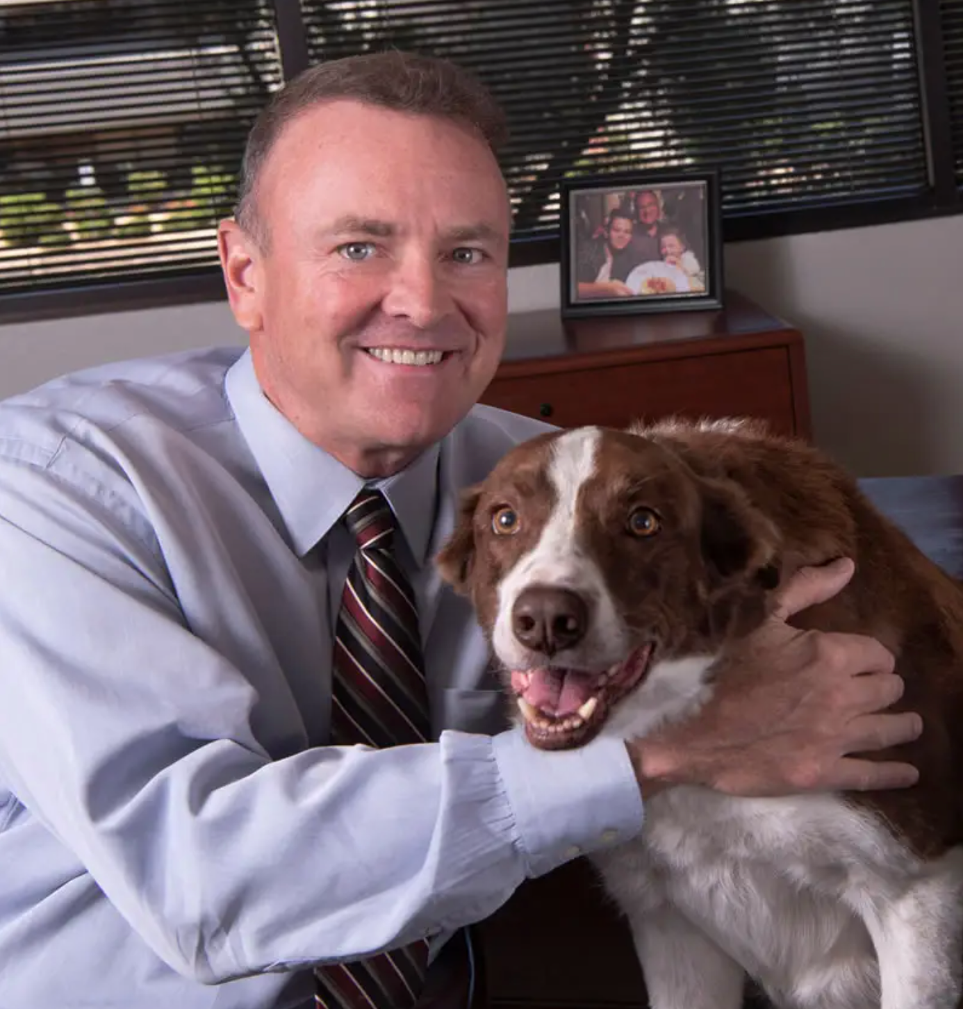 Lewis B. Moore of Moore Injury Law in Phoenix, AZ with his dog.