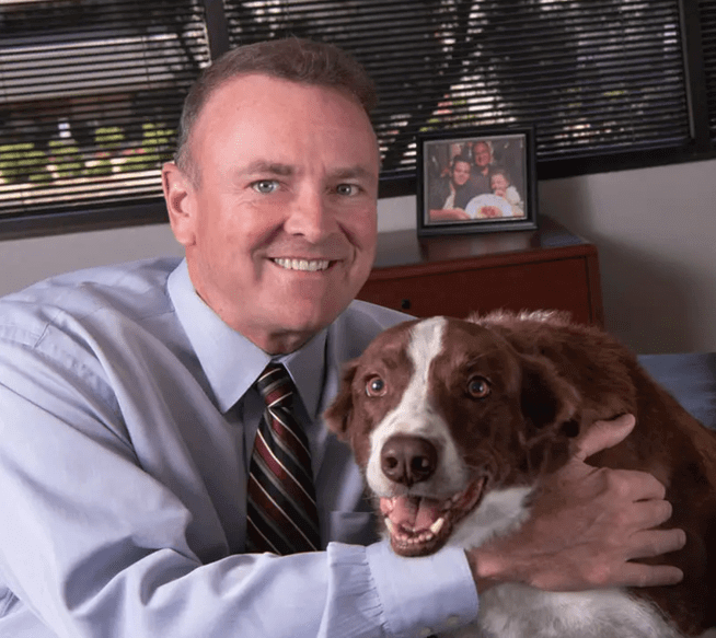 Lewis B. Moore of Moore Injury Law in Phoenix, AZ with his dog.